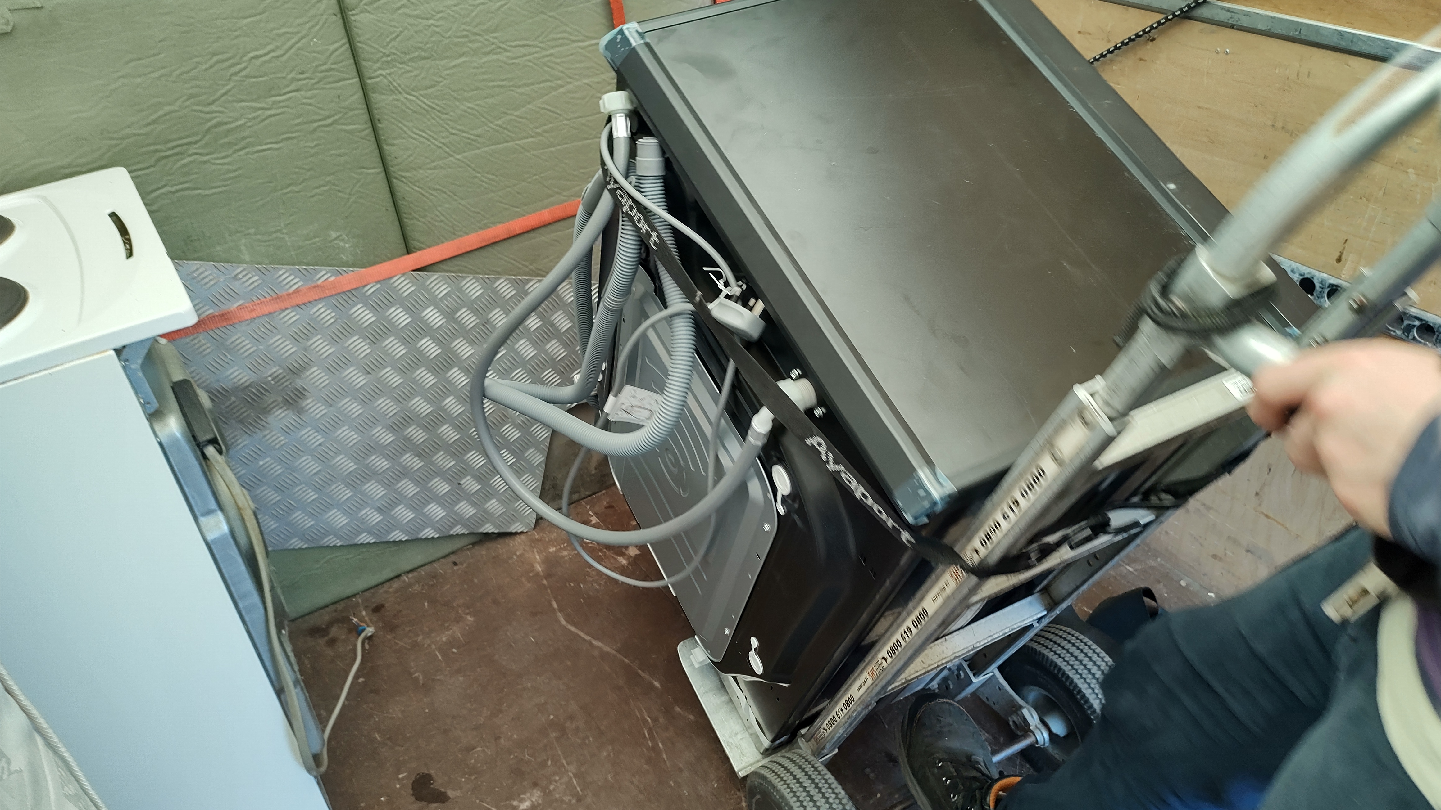 Moving appliances with sack truck